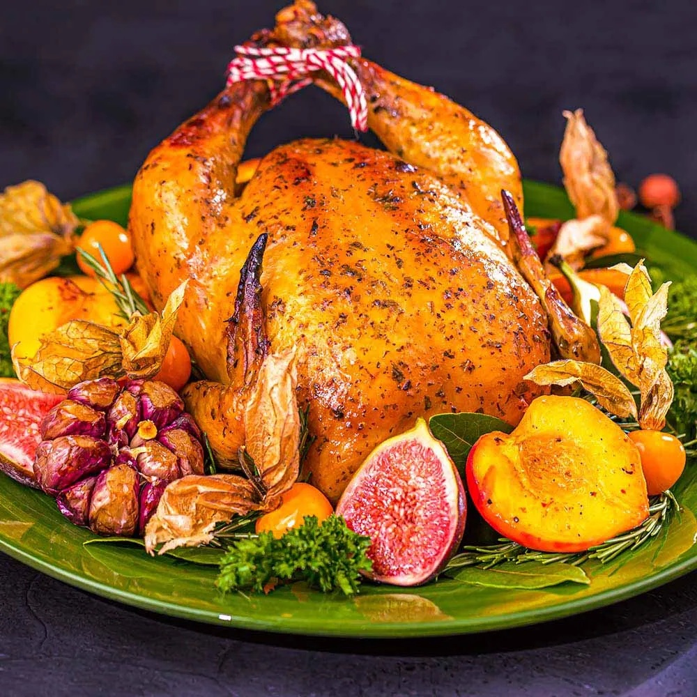 Receita de Frango de natal com alho assado e pêssegos dourados