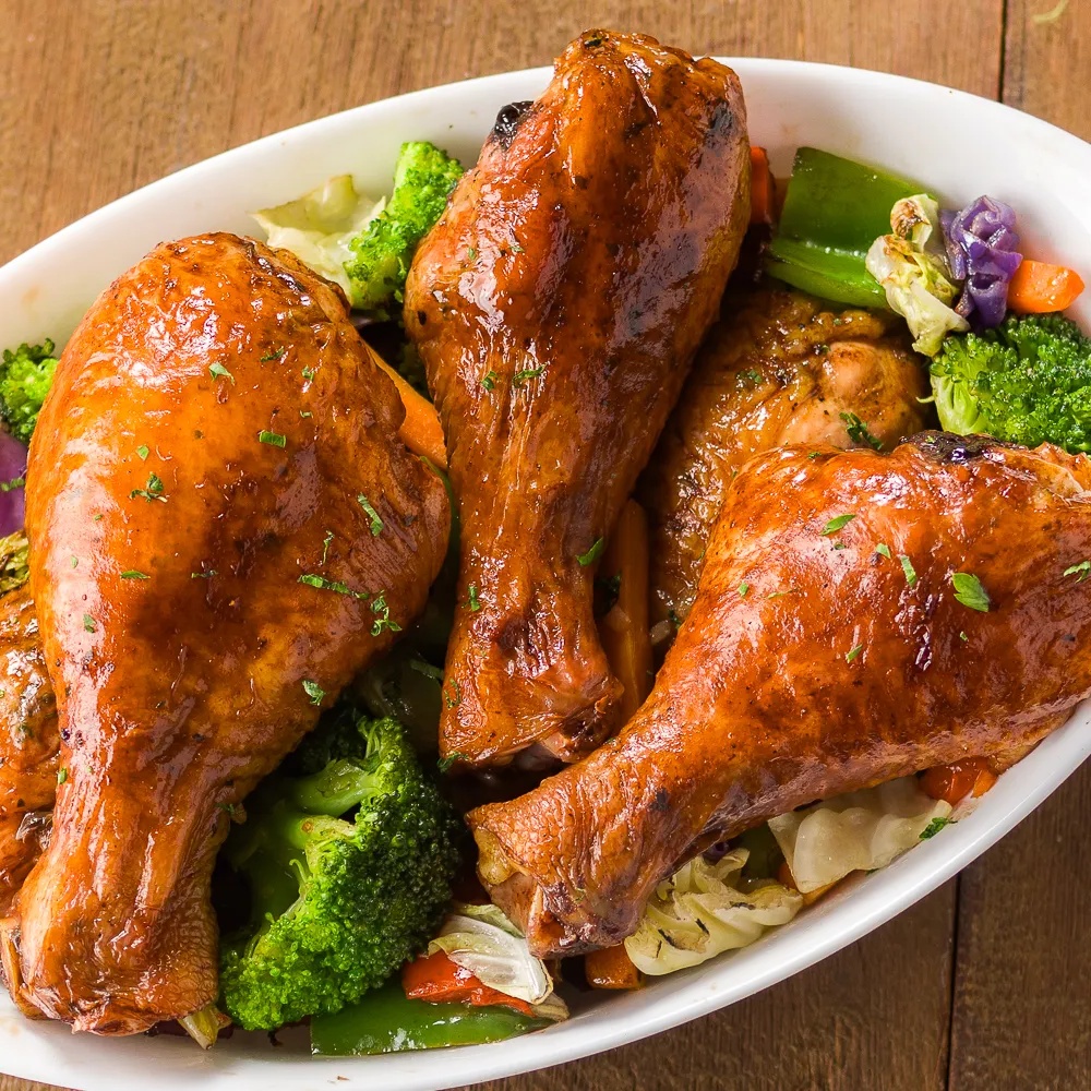 Coxa de frango com legumes grelhados