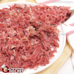Segue o título solicitado:

Como fazer a Carne de Sol Acebolada mais irresistível do Réveillon!